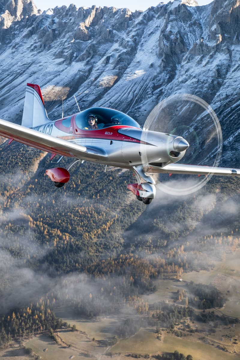 Bristell B23 Mosaic banking in front of the Dolomites