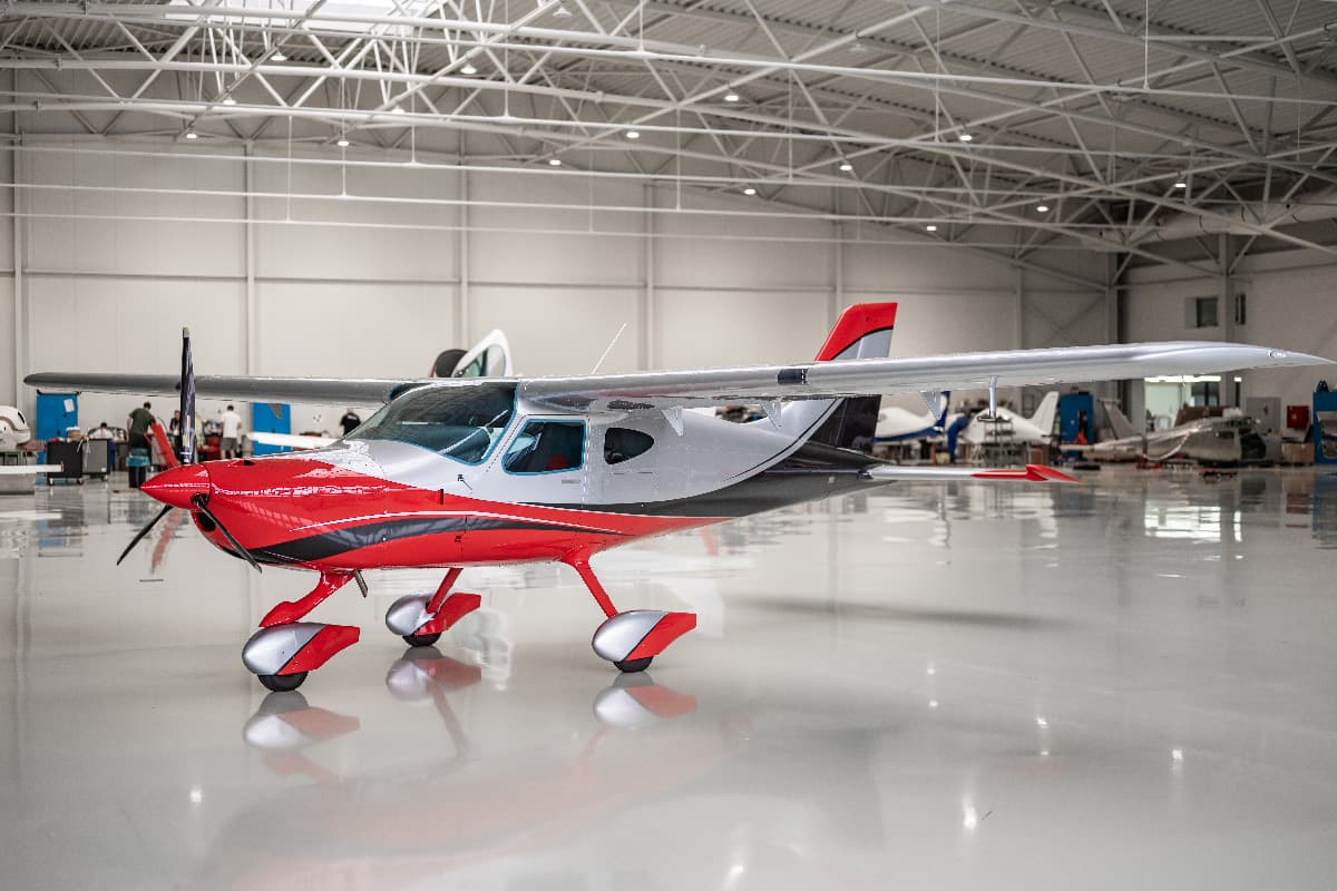 Bristell B8M all-metal airframe seen in profile in the hangar
