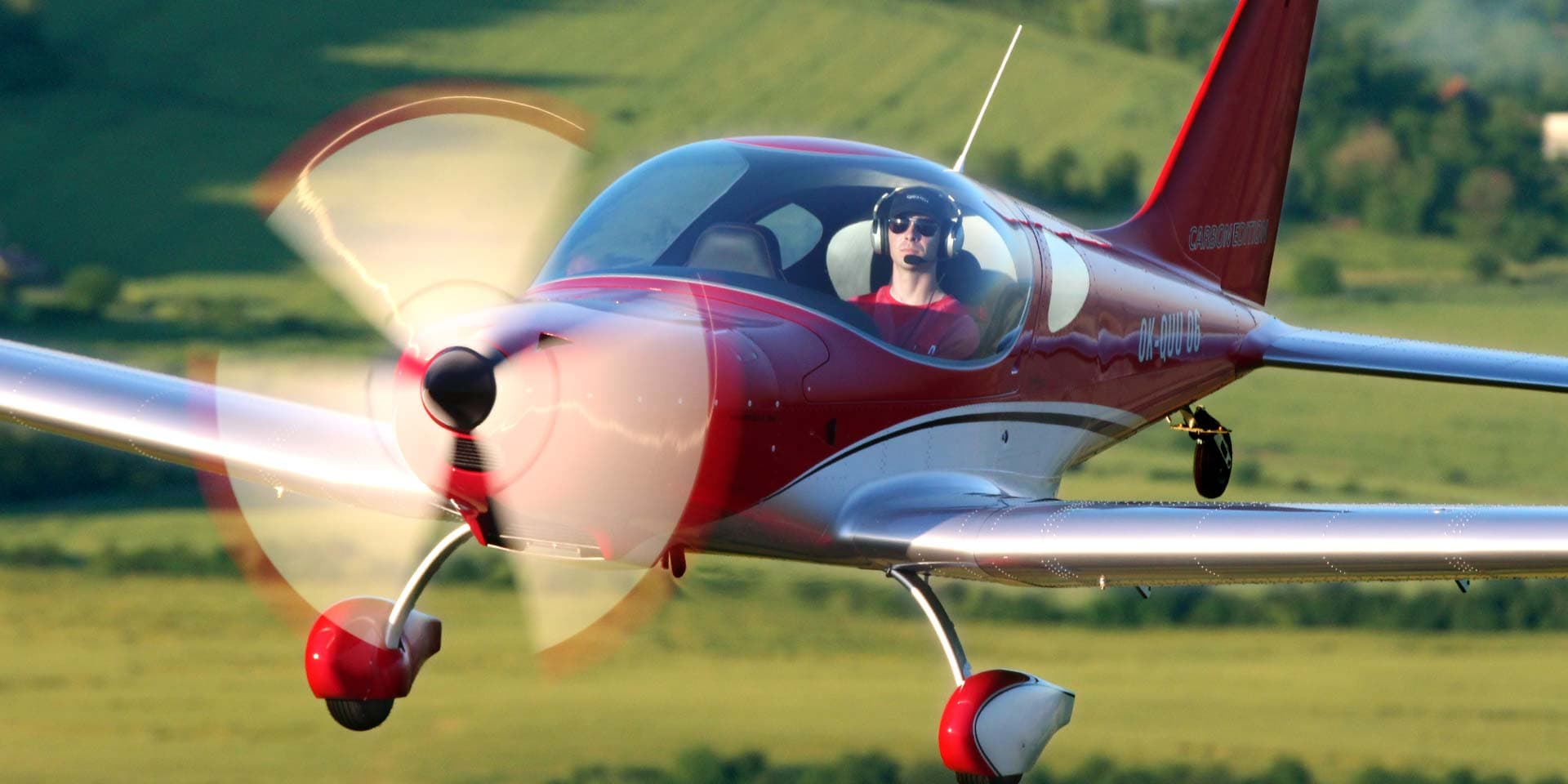 Bristell TDO taildragger in flight at golden hour, tailwheel gear visible